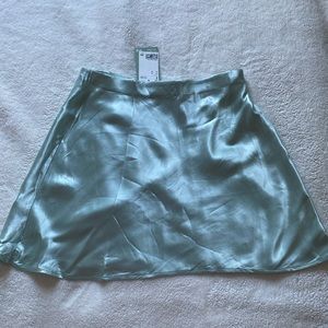 H&M satin mini A-line skirt. New with tags. Size M.